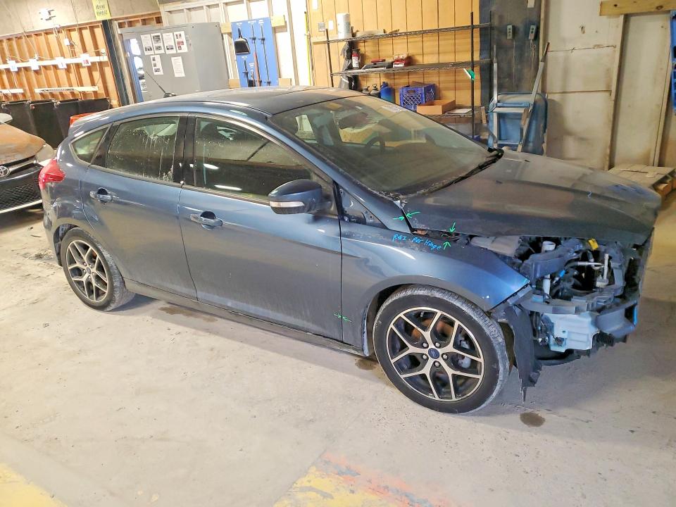 Photo 4 from auction – 2018 FORD FOCUS with VIN 1FADP3M26JL258149