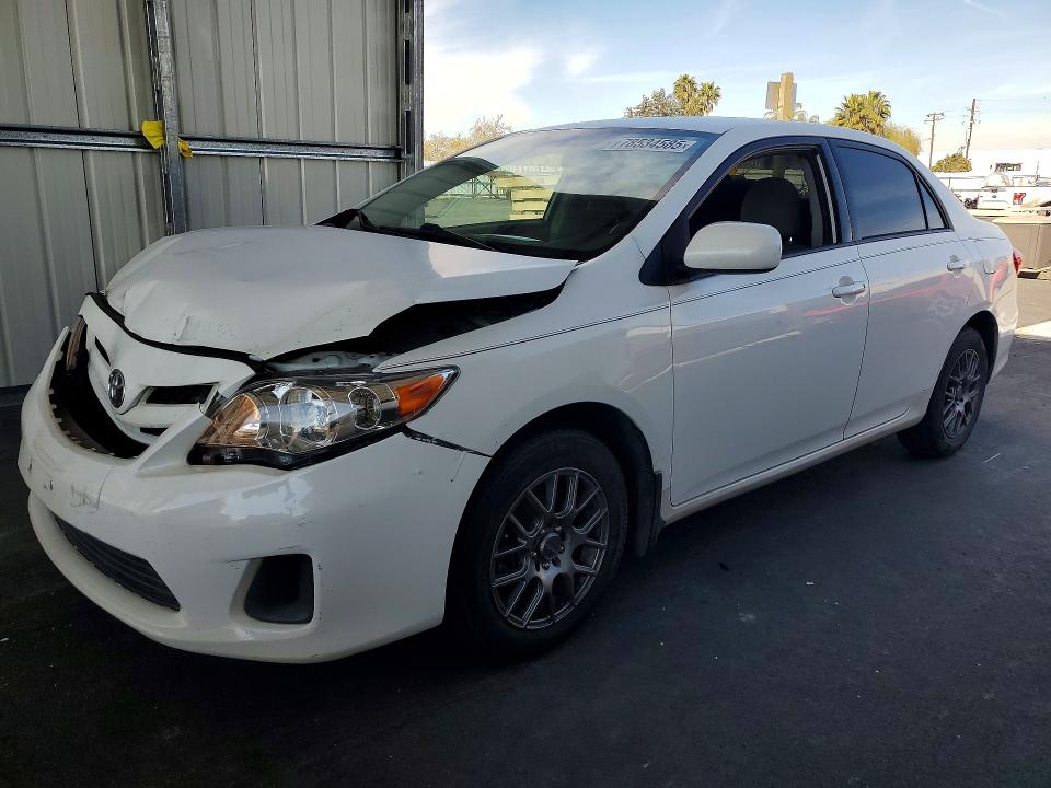 TOYOTA COROLLA 2011 with VIN 2T1BU4EE5BC730309 - Photo from auction