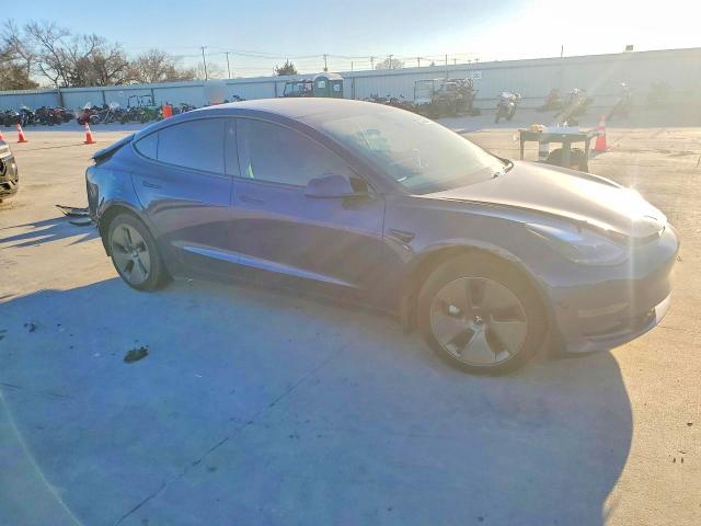 Photo 4 from auction – 2023 TESLA MODEL 3 with VIN 5YJ3E1EAXPF565003