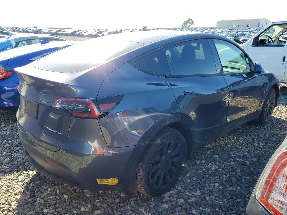 Photo 3 from auction – 2022 TESLA MODEL Y with VIN 7SAYGDEE8NF329325