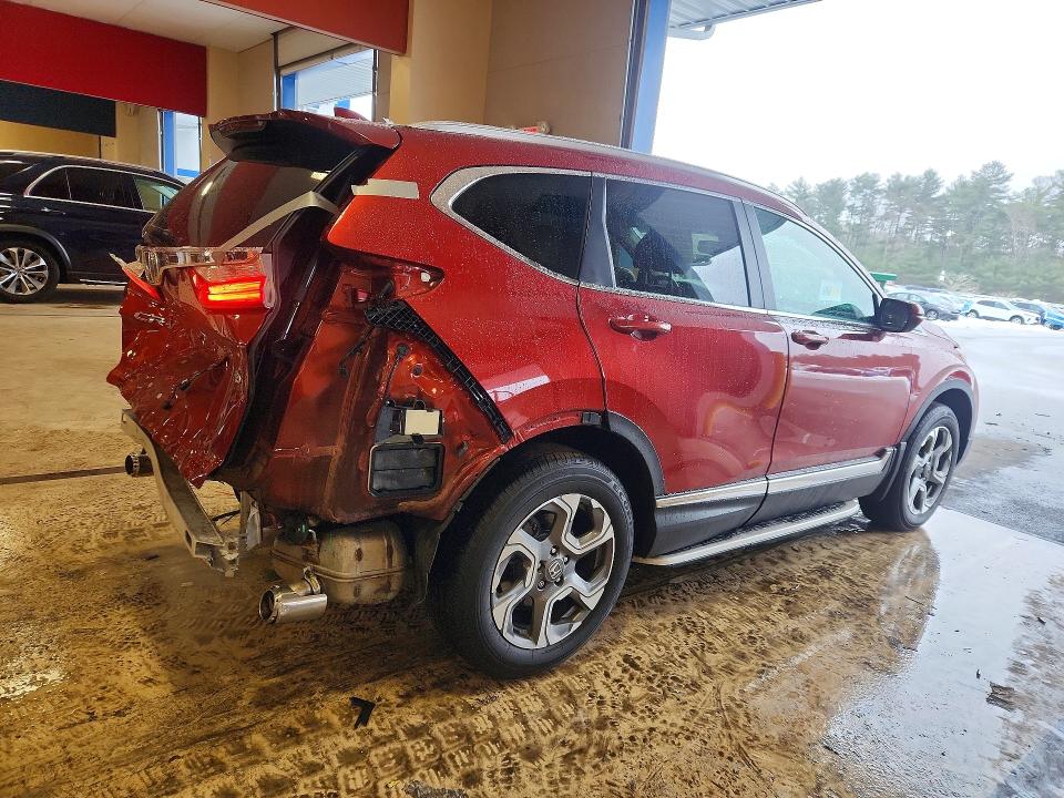 Photo 3 from auction – 2017 HONDA CR-V with VIN 5J6RW2H86HL032015