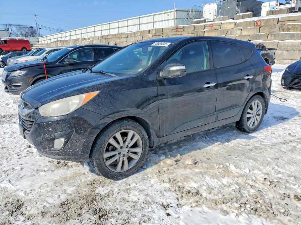 HYUNDAI TUCSON GLS 2012 with VIN KM8JUCAC3CU319856 - Photo from auction
