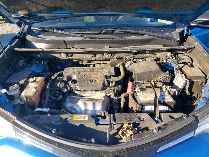 Photo 12 from auction – 2018 TOYOTA RAV4 LE with VIN JTMZFREV5JJ735907