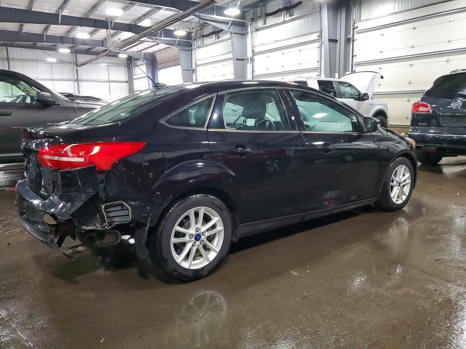 Photo 3 from auction – 2016 FORD FOCUS with VIN 1FADP3F29GL246129