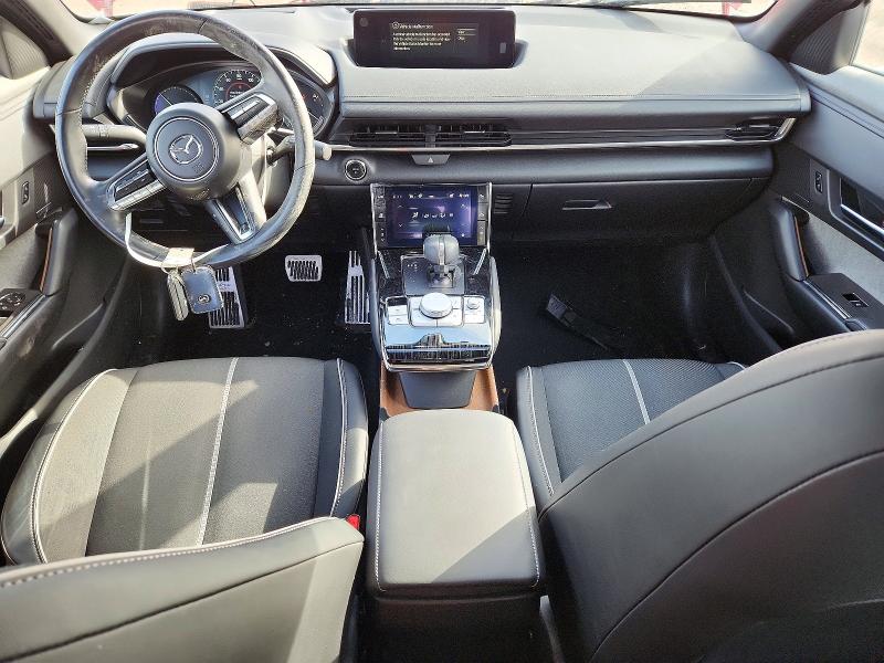 Photo 8 from auction – 2023 MAZDA MX-30 with VIN JM1DRADB8P0200109