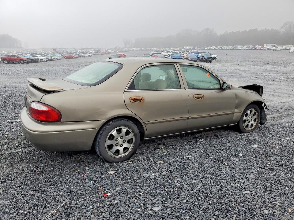 Photo 3 from auction – 2001 MAZDA 626 with VIN 1YVGF22C815237138