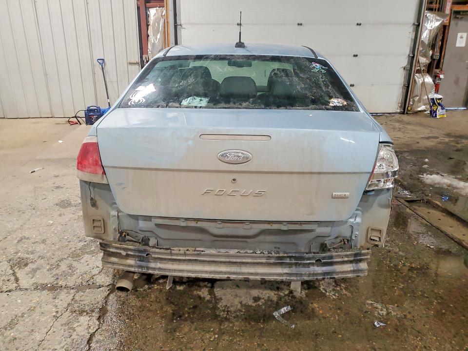 Photo 6 from auction – 2009 FORD FOCUS with VIN 1FAHP37N49W219447