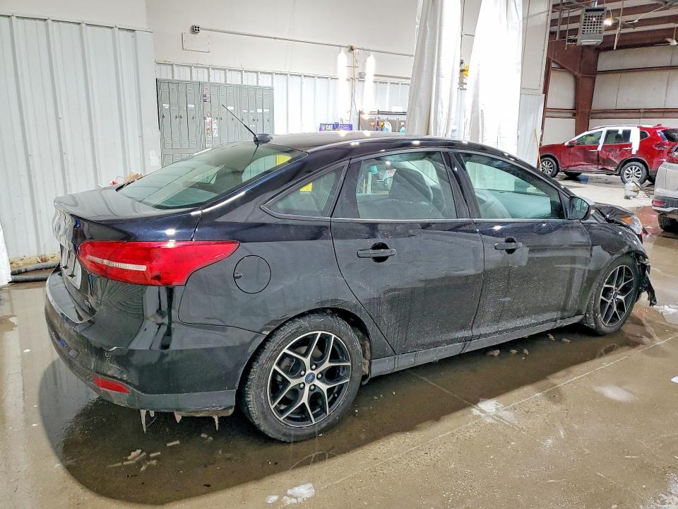 Photo 3 from auction – 2017 FORD FOCUS with VIN 1FADP3H21HL327964