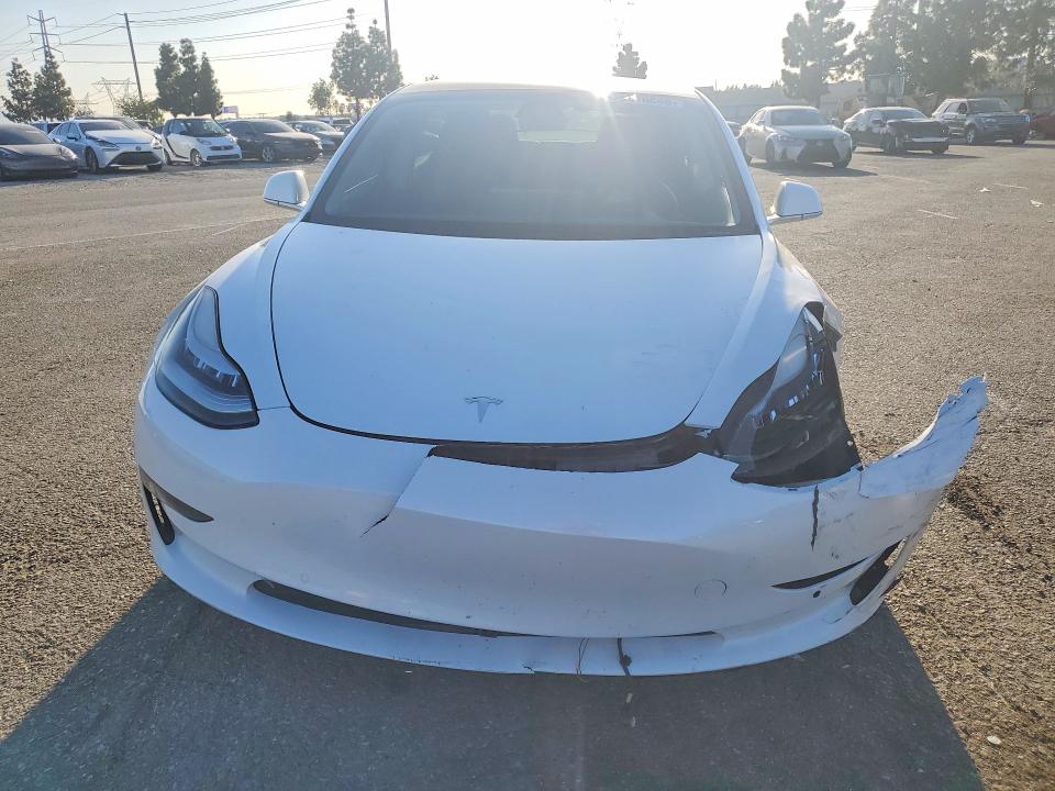 Photo 5 from auction – 2020 TESLA MODEL 3 with VIN 5YJ3E1EA8LF660671