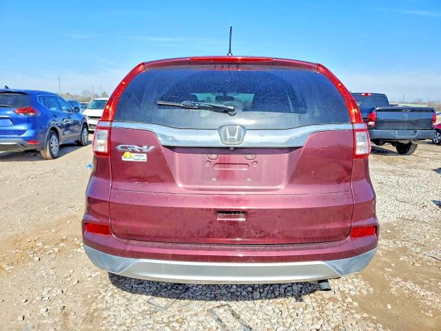 Photo 6 from auction – 2015 HONDA CR-V with VIN 2HKRM3H50FH554745