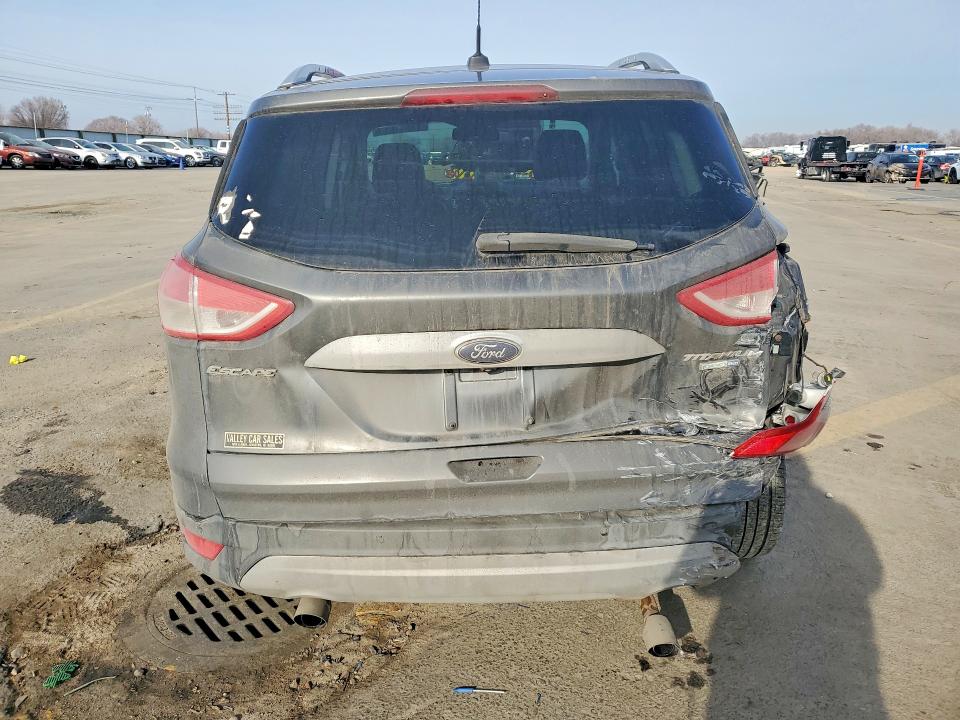 Photo 6 from auction – 2015 FORD ESCAPE TIT with VIN 1FMCU9J90FUA39011