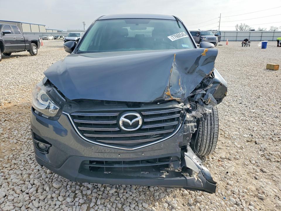 Photo 5 from auction – 2016 MAZDA CX-5 with VIN JM3KE2CY6G0639797