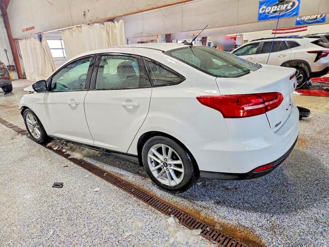 Photo 2 from auction – 2015 FORD FOCUS SE with VIN 1FADP3F20FL354119