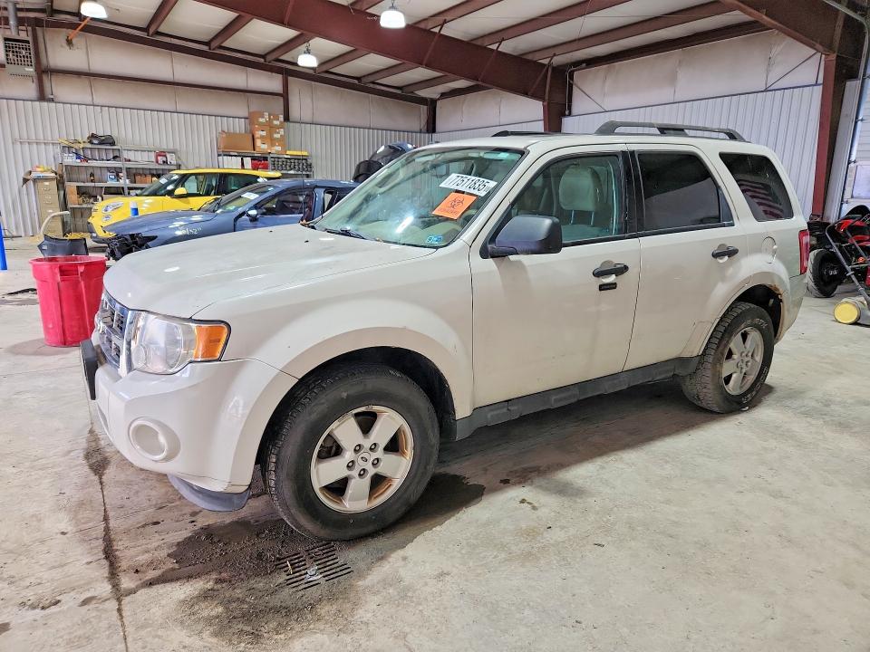 FORD ESCAPE XLT 2011 with VIN 1FMCU9DG5BKA36976 - Photo from auction