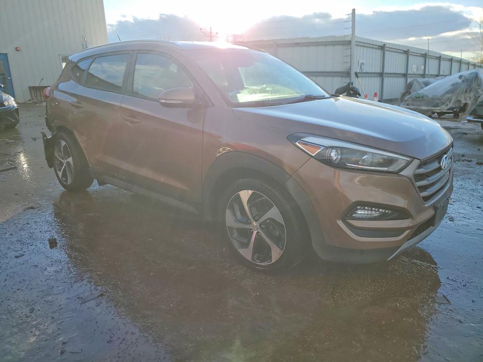 Photo 4 from auction – 2016 HYUNDAI TUCSON with VIN KM8J33A27GU252548