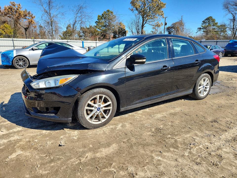 FORD FOCUS 2015 with VIN 1FADP3F27FL253255 - Photo from auction