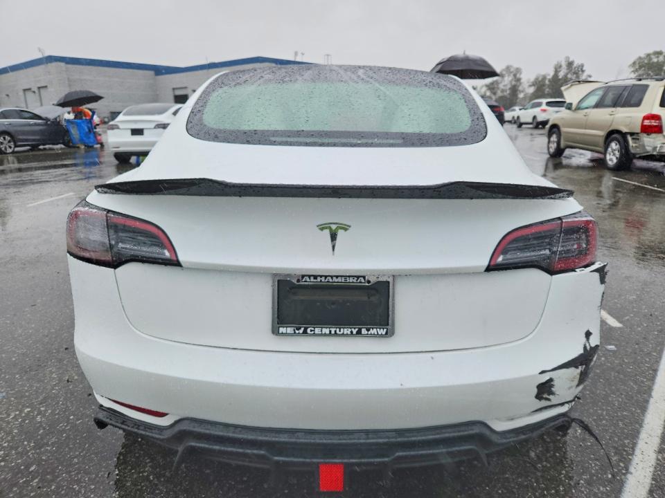 Photo 6 from auction – 2023 TESLA MODEL 3 with VIN 5YJ3E1EAXPF711142