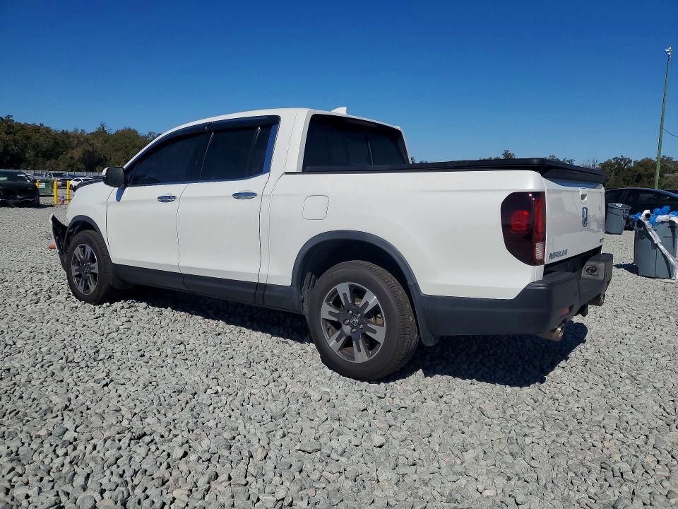Photo 2 from auction – 2022 HONDA RIDGELINE with VIN 5FPYK3F75NB029772