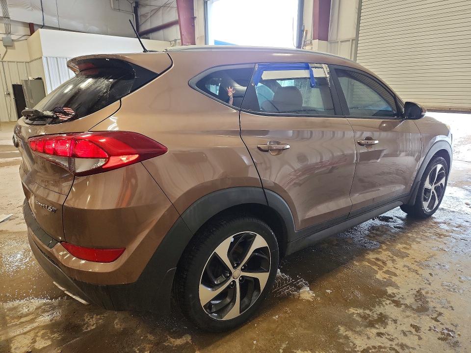 Photo 3 from auction – 2016 HYUNDAI TUCSON with VIN KM8J33A28GU195373