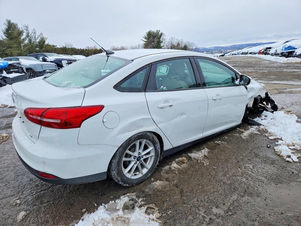 Photo 3 from auction – 2016 FORD FOCUS with VIN 1FADP3F20GL265779