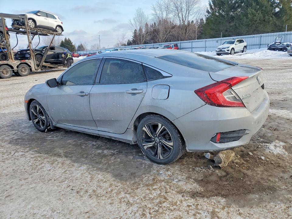 Photo 2 from auction – 2018 HONDA CIVIC LX with VIN 2HGFC2F58JH037084