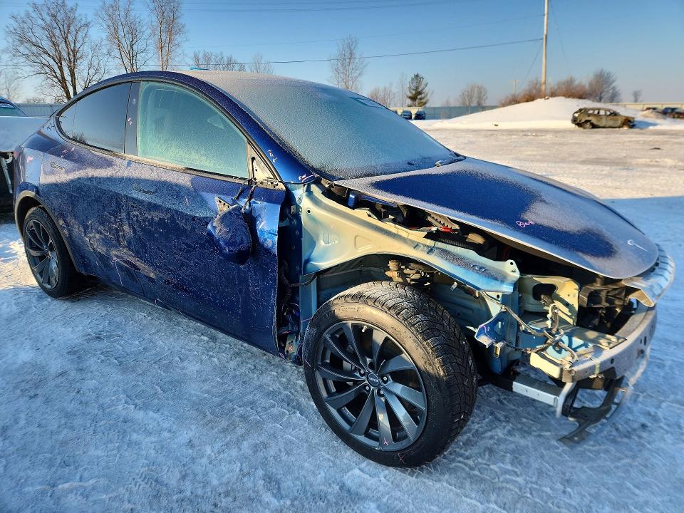 Photo 4 from auction – 2023 TESLA MODEL Y with VIN 7SAYGAEE9PF871700