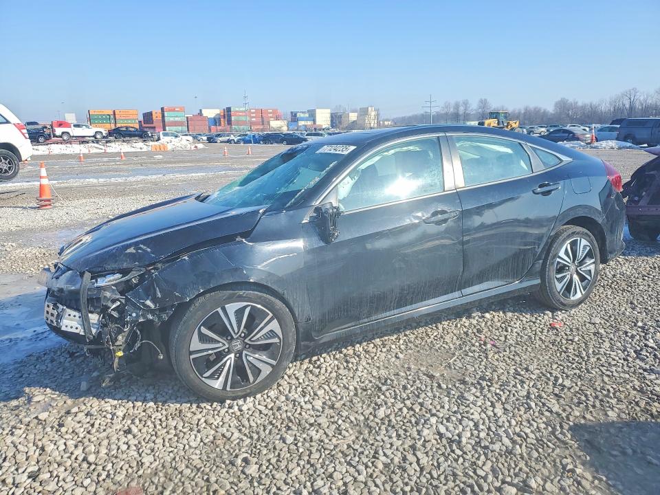 HONDA CIVIC EX 2017 with VIN 19XFC2F75HE076544 - Photo from auction