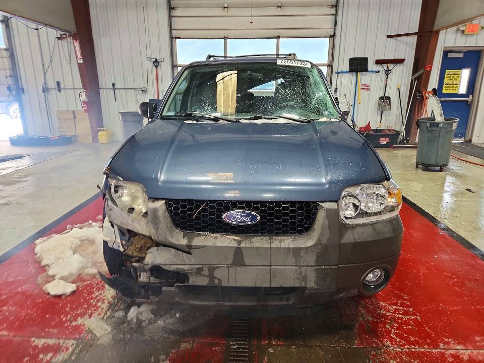Photo 5 from auction – 2005 FORD ESCAPE XLT with VIN 1FMYU93155KB03342