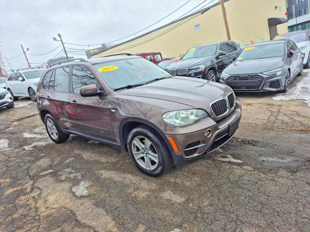 BMW X5 2013 with VIN 5UXZV4C56D0E09683 - Photo from auction