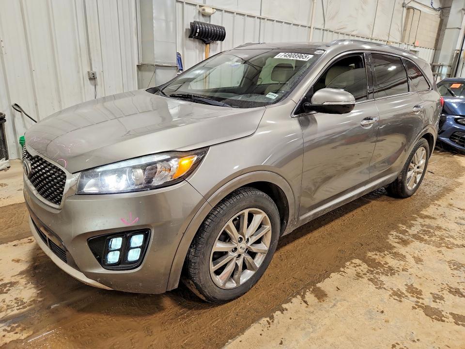 KIA SORENTO 2017 with VIN 5XYPK4A56HG311139 - Photo from auction
