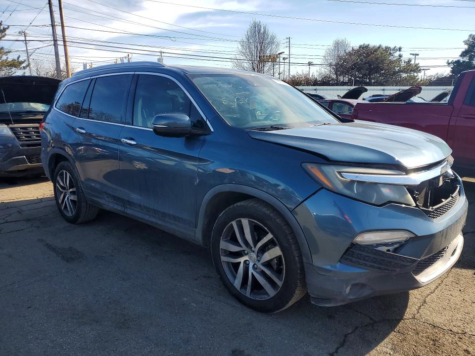 Photo 4 from auction – 2016 HONDA PILOT ELIT with VIN 5FNYF6H08GB105843