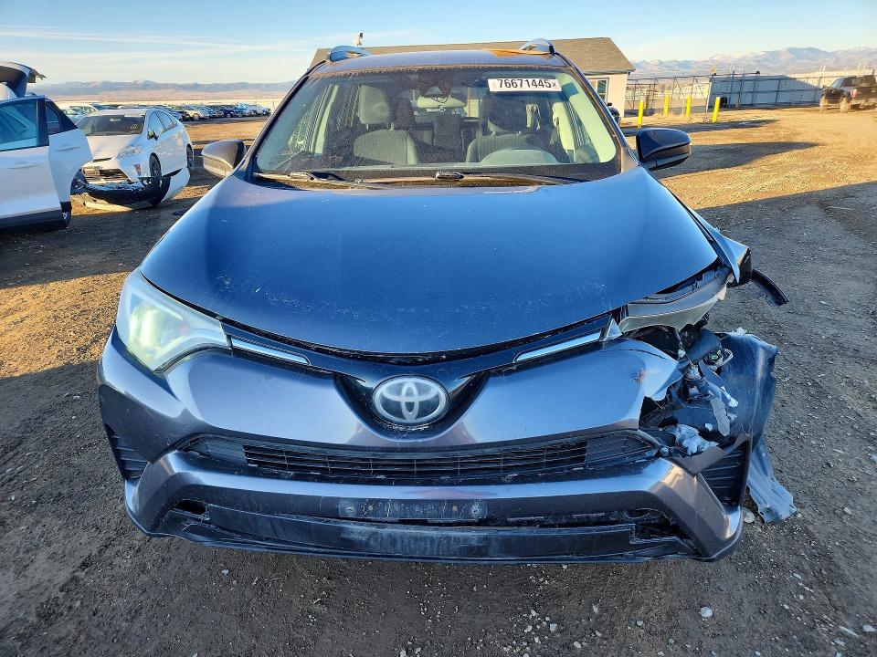 Photo 5 from auction – 2017 TOYOTA RAV4 LE with VIN 2T3BFREV4HW643684