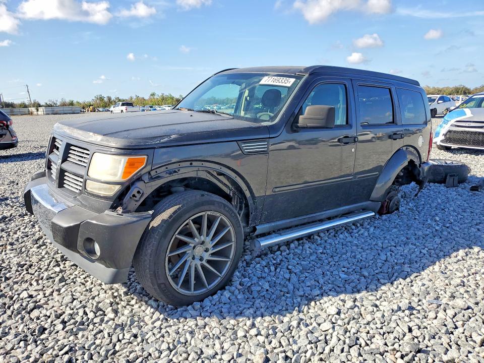 DODGE NITRO 2010 with VIN 1D4PT4GK5AW171879 - Photo from auction