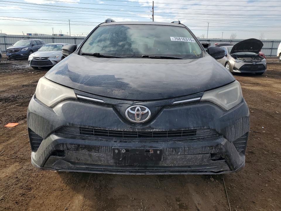Photo 5 from auction – 2016 TOYOTA RAV4 with VIN 2T3ZFREV9GW308787