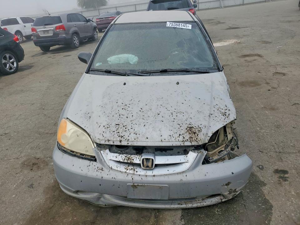 Photo 5 from auction – 2003 HONDA CIVIC LX with VIN 1HGEM22513L034757
