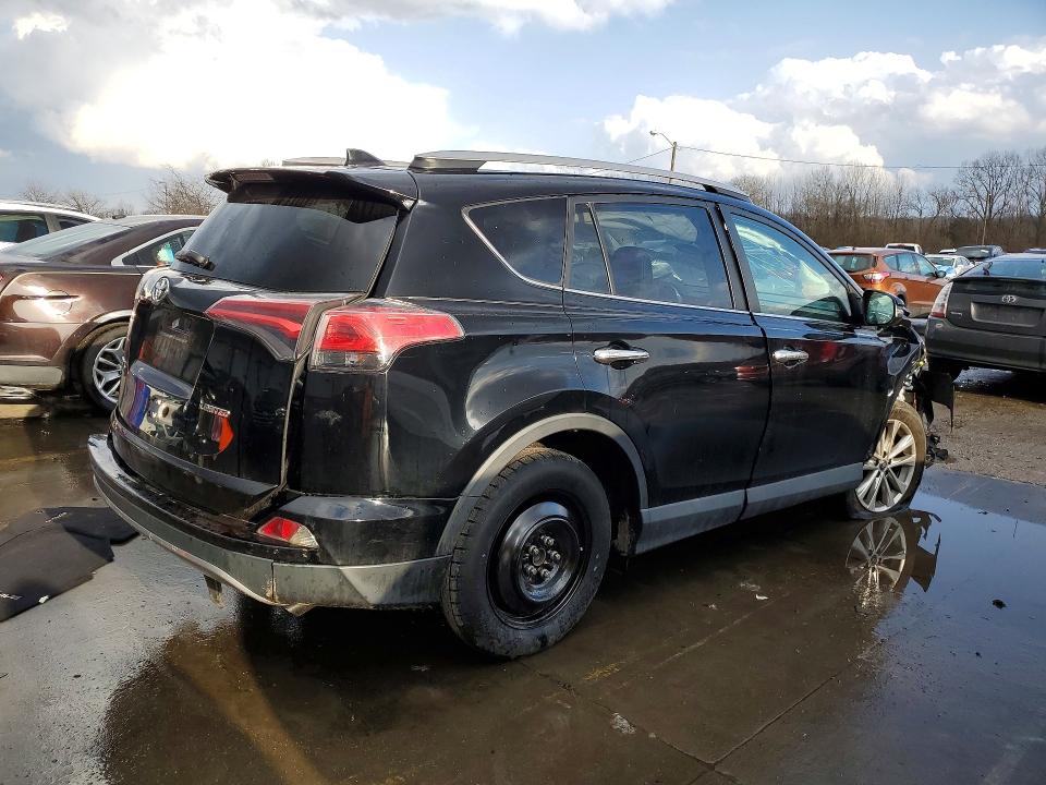 Photo 3 from auction – 2018 TOYOTA RAV4 with VIN 2T3YFREV7JW495692
