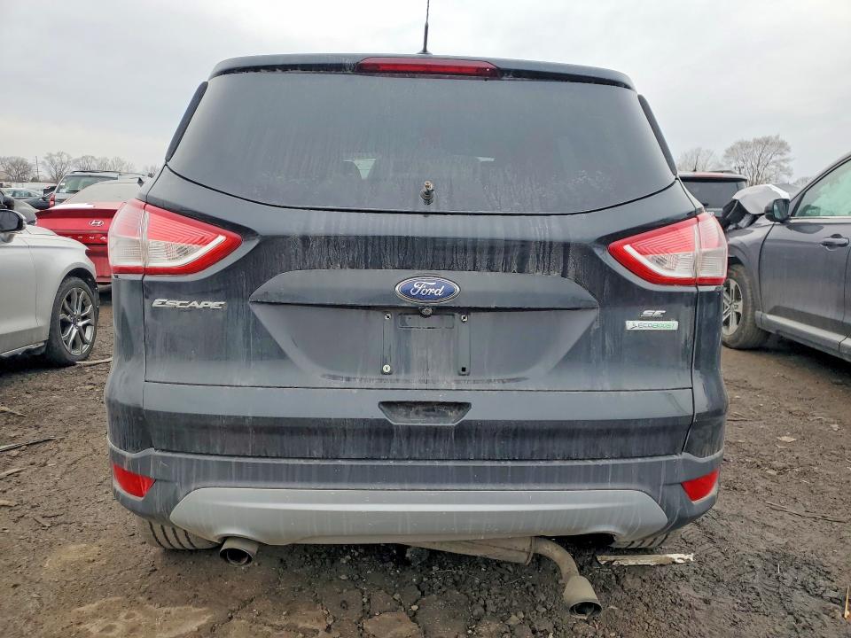 Photo 6 from auction – 2014 FORD ESCAPE with VIN 1FMCU0GX7EUB77032