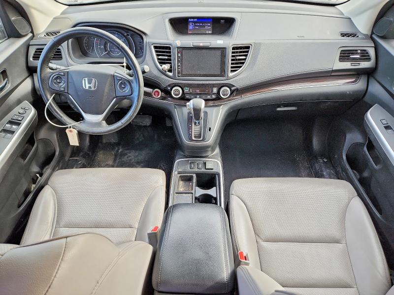 Photo 8 from auction – 2015 HONDA CR-V with VIN 2HKRM3H72FH517696