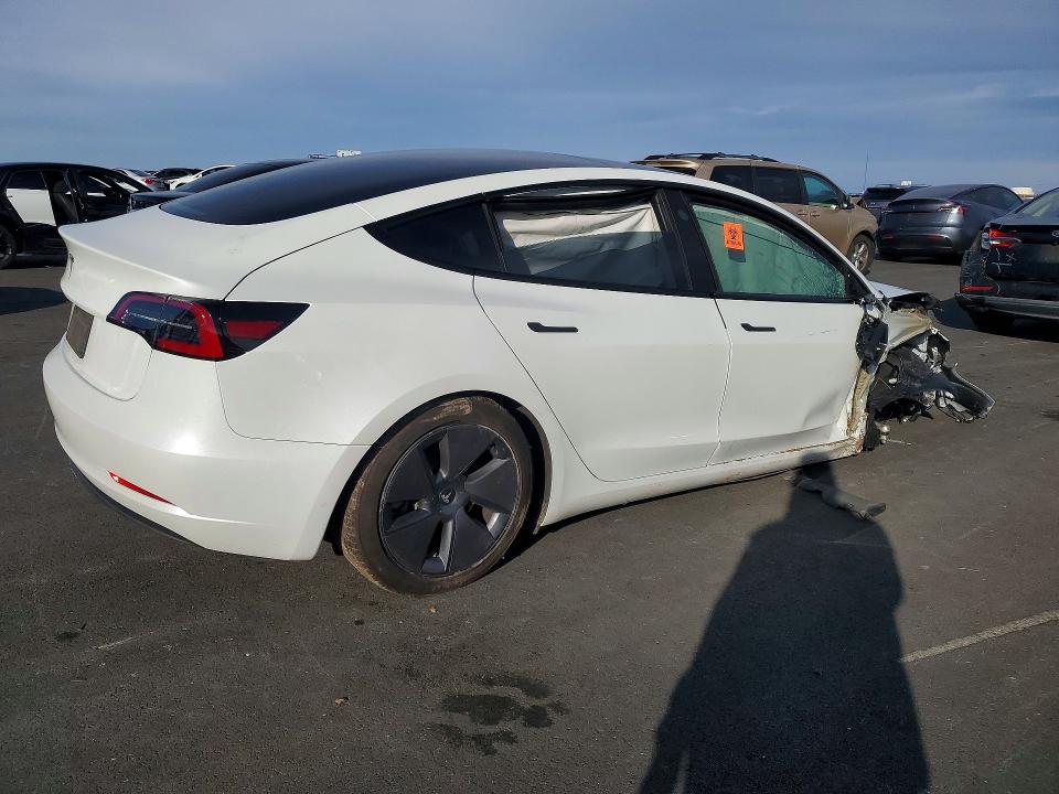 Photo 3 from auction – 2023 TESLA MODEL 3 with VIN 5YJ3E1EA8PF562360