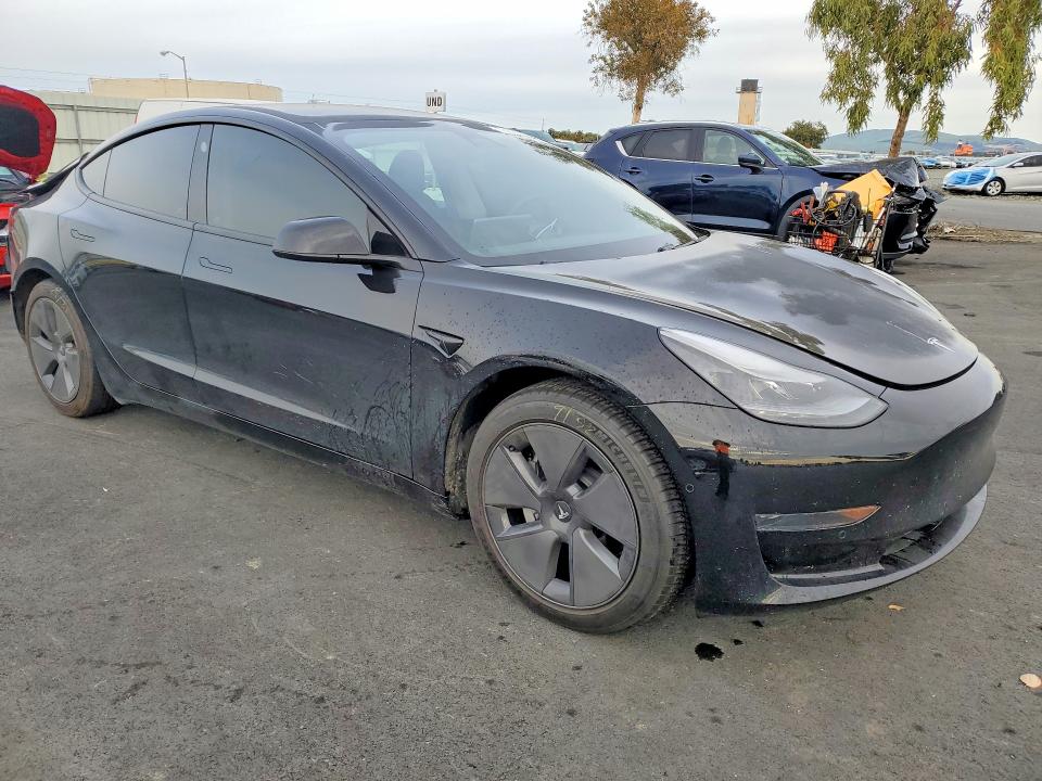 Photo 4 from auction – 2021 TESLA MODEL 3 with VIN 5YJ3E1EA9MF998114