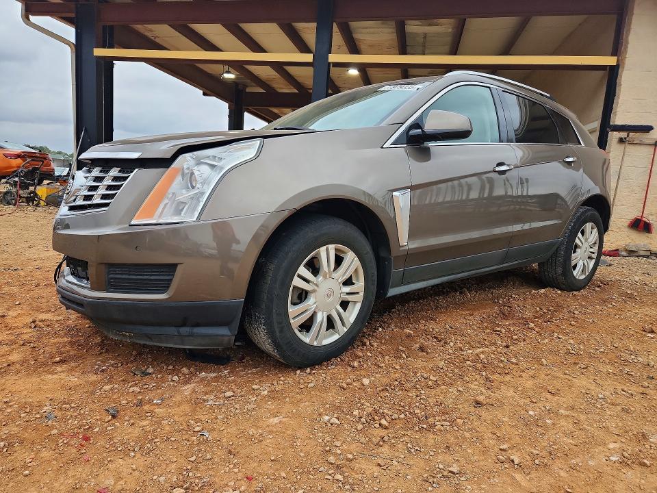 CADILLAC SRX 2014 with VIN 3GYFNBE34ES640832 - Photo from auction
