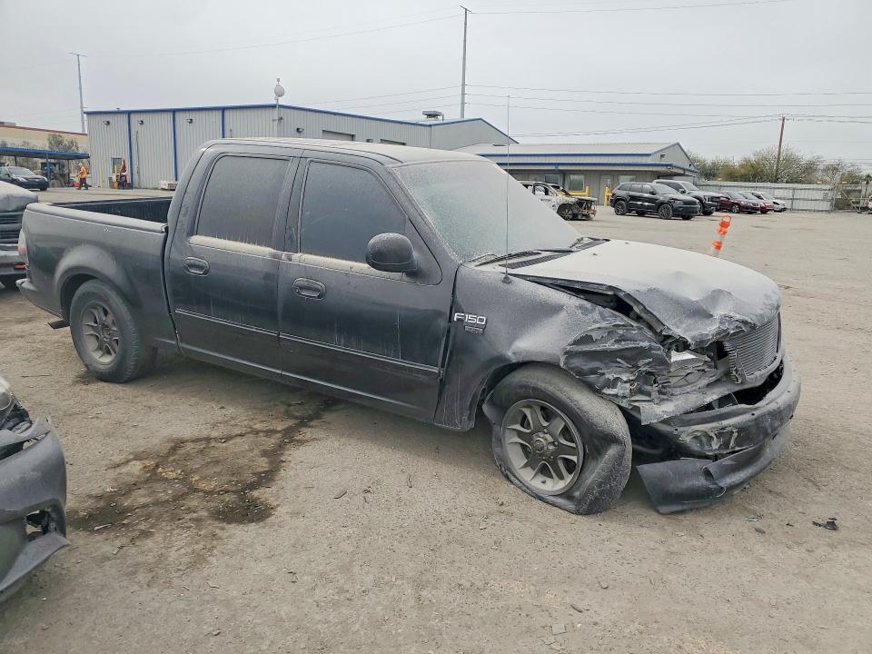Photo 4 from auction – 2001 FORD F150 SUPER with VIN 1FTRW07L31KE05880