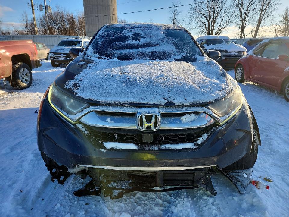 Photo 5 from auction – 2018 HONDA CR-V EX with VIN 2HKRW2H53JH620055