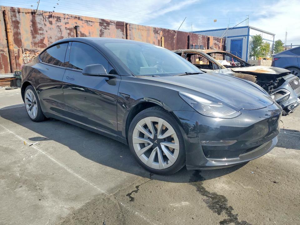 Photo 4 from auction – 2021 TESLA MODEL 3 with VIN 5YJ3E1EB2MF871259