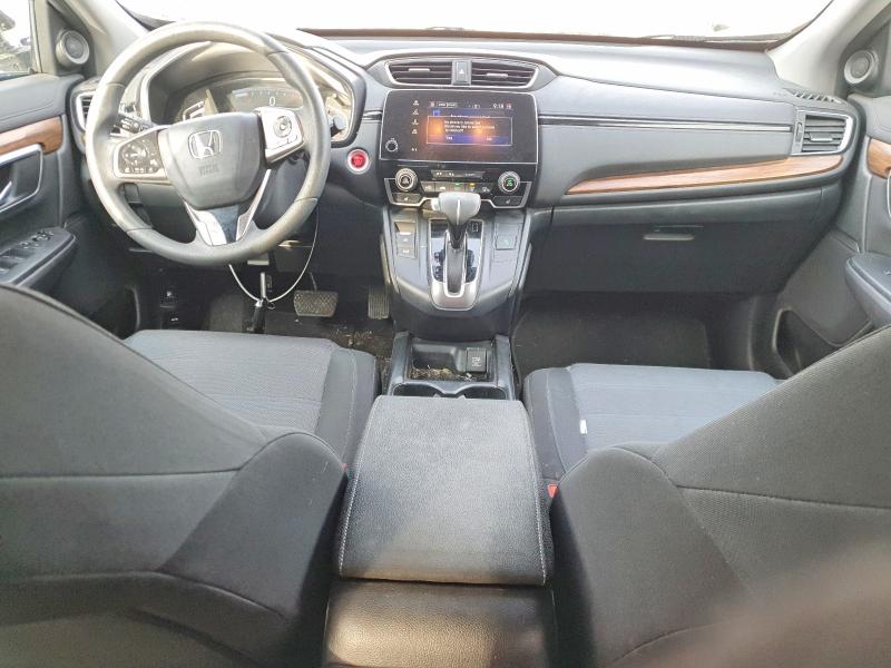 Photo 8 from auction – 2017 HONDA CR-V with VIN 7FARW1H53HE000359