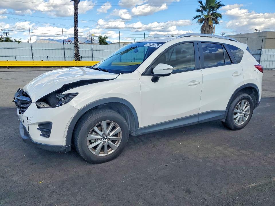 MAZDA CX-5 SPORT 2016 с VIN JM3KE2BYXG0716379 - Фото с аукциона