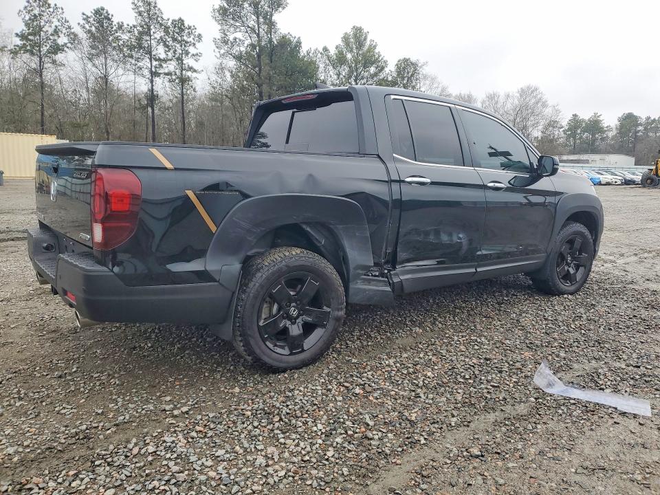 Photo 3 from auction – 2021 HONDA RIDGELINE with VIN 5FPYK3F74MB026523