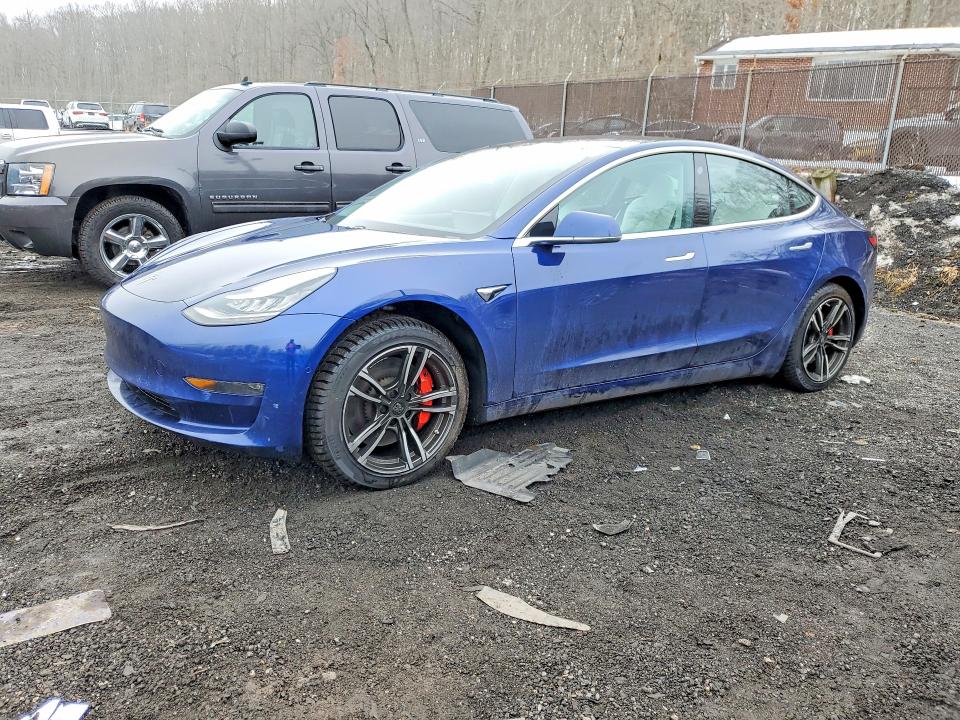 TESLA MODEL 3 2018 with VIN 5YJ3E1EB4JF080842 - Photo from auction