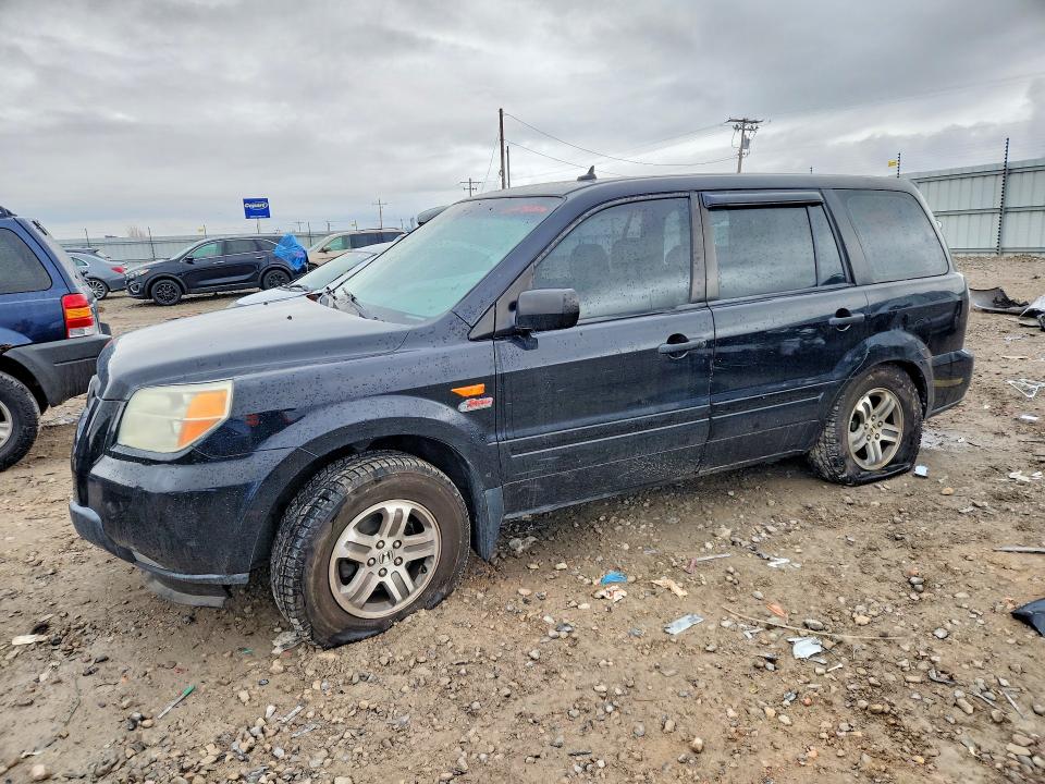 HONDA PILOT LX 2006 with VIN 2HKYF18186H547548 - Photo from auction