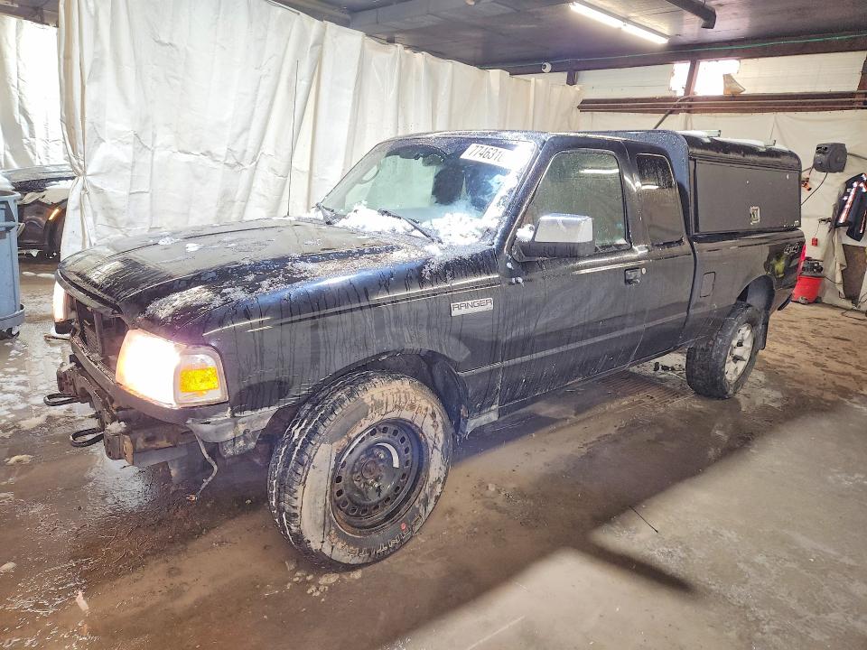 FORD RANGER 2011 with VIN 1FTLR4FE5BPB09710 - Photo from auction
